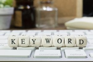 keyword cube with keyboard background